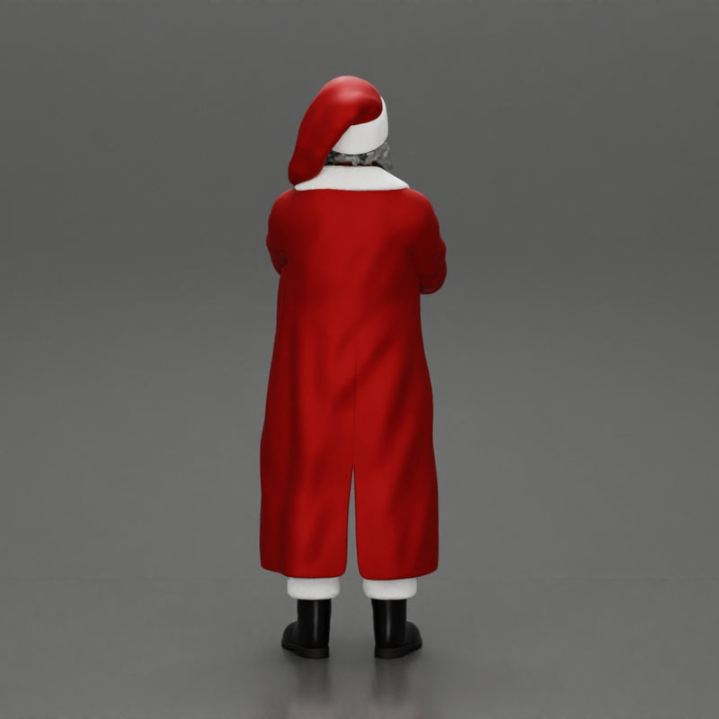 Santa Claus stands with his arms crossed