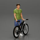 Young Man Standing In The Forest Posing Proudly With His Bike - Only-Games