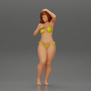 Sexy girl in bikini standing and covering her body by towel - Only-Games
