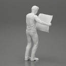 Young Man Holding Map And Looking At It While Standing On The City - Only-Games