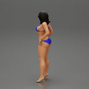 sexy girl in bikini posing standing on the beach - Only-Games