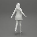 Business woman in manteau dragging suitcase  walking in airport terminal - Only-Games