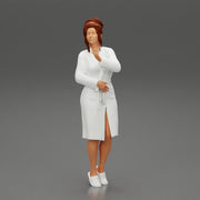 woman in a white bathrobe standing - Only-Games