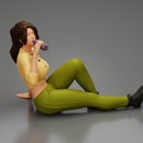 Tired woman mechanic in sexy shirt pants sitting and drinking water during from bottle - Only-Games