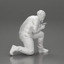 Gangster in hat and jacket sitting and holding a gun hides behind the car - Only-Games