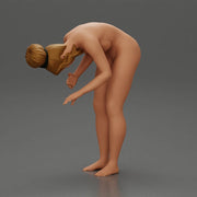 Naked Girl standing behind her boyfriend gently touching his face - Only-Games