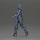 Woman Confidently Walks Forward in Stylish Green and Red Outfit - Only-Games