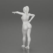 Sexy fitness girl leaning on a wall while standing outdoors - Only-Games