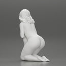 Sexy girl in bikini sitting and covering her body by towel - Only-Games