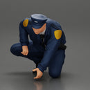 policeman officer sitting and puts handcuffs on a gangster - Only-Games