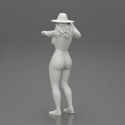 Travel woman in hat and short pointing her next destination using world map - Only-Games