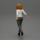 2 Business woman in shirt and trousers pulling suitcase walking in airport terminal - Only-Games