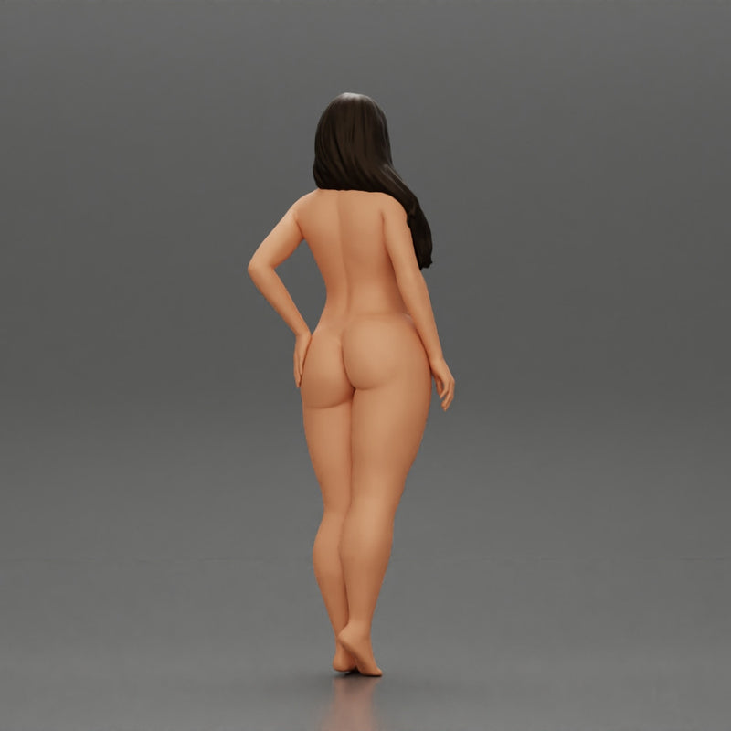 Naked girl standing putting her left hand on her hip