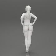 Fit hot woman in bikini taking off swimsuit panties on the beach - Only-Games