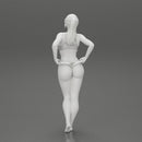 Fit hot woman in bikini taking off swimsuit panties on the beach - Only-Games