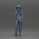 beautiful girl in pants and a hat thinking - Only-Games