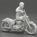 Motorbiker standing pushing his motorbike - Only-Games