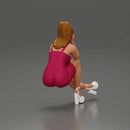 Woman in Pink Dress and heels sitting Deep in Thought - Only-Games