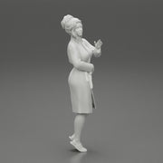 woman in a white bathrobe standing - Only-Games