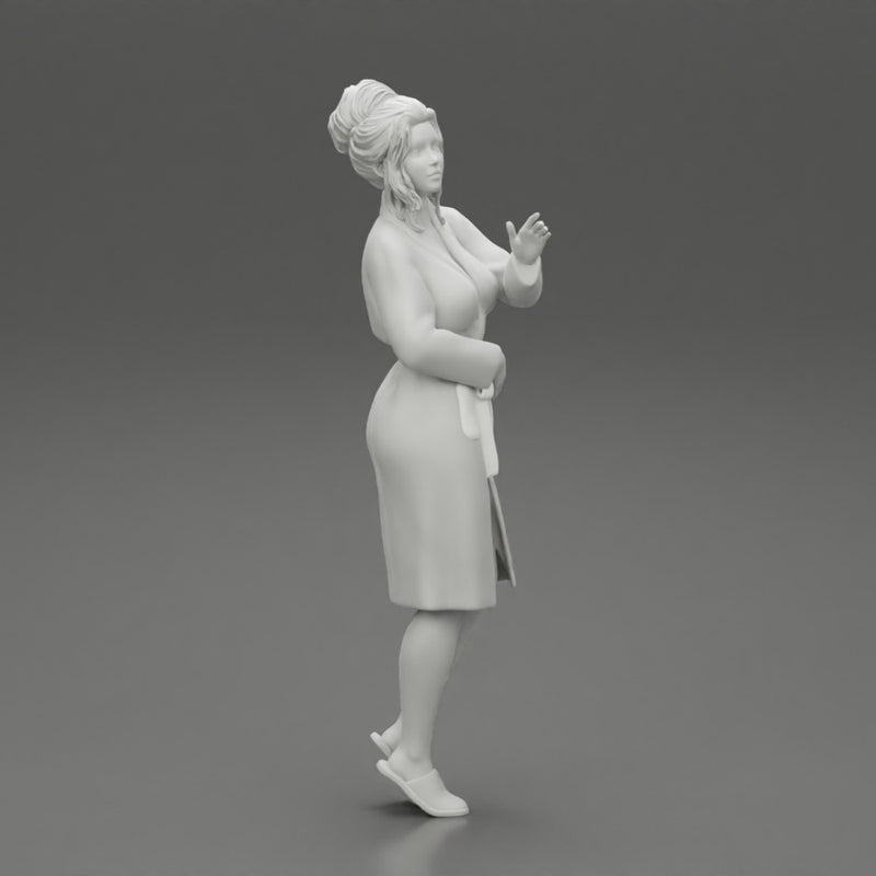 woman in a white bathrobe standing - Only-Games