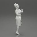 woman in a white bathrobe standing - Only-Games