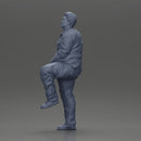 Fat Asian man looking upward in shirt and pants with one leg placed on a step - Only-Games