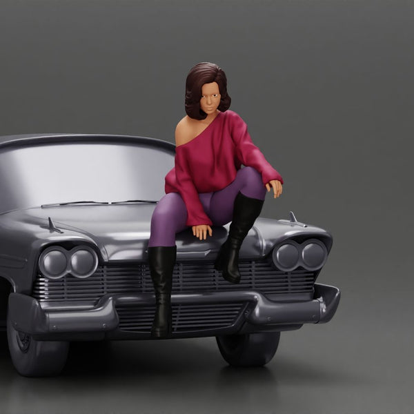 lowrider girl sitting on a car, wearing boots and a stylish shirt