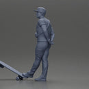 skater man leaning against the wall wearing a cap and banana bag - Only-Games