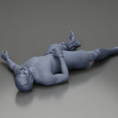 Defeated fighter lying on the floor after the battle - Only-Games