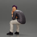 metal man sitting and contemplating with a satanic haircut - Only-Games