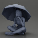 Pretty Girl with an Umbrella in bra and Shorts, Sitting - Only-Games