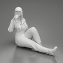 Tired woman mechanic in suit and cap sitting and drinking water during from bottle - Only-Games