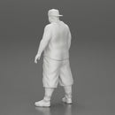 Big strong gangster homie in cap turned backwards and tank shirt standing - Only-Games