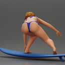 Confident surfer woman in a bikini, riding a wave on her surfboard - Only-Games
