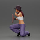 Young girl wearing a hat and pants sitting holding a sign and hitchhiking - Only-Games