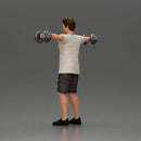 Man in the gym performing shoulder exercises with weights - Only-Games