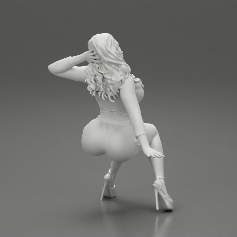 Young sexy girl in shorts with long hair is sitting with one hand in hair - Only-Games