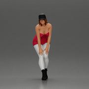 beautiful woman placing her hand on her legs, wearing a cap and a bra top - Only-Games