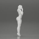 sexy girl in mini overalls posing smoking cigarette on the beach - Only-Games