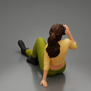 Tired woman mechanic in sexy shirt pants sitting and drinking water during from bottle - Only-Games