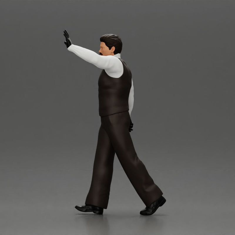 man in suit raising hand up walking