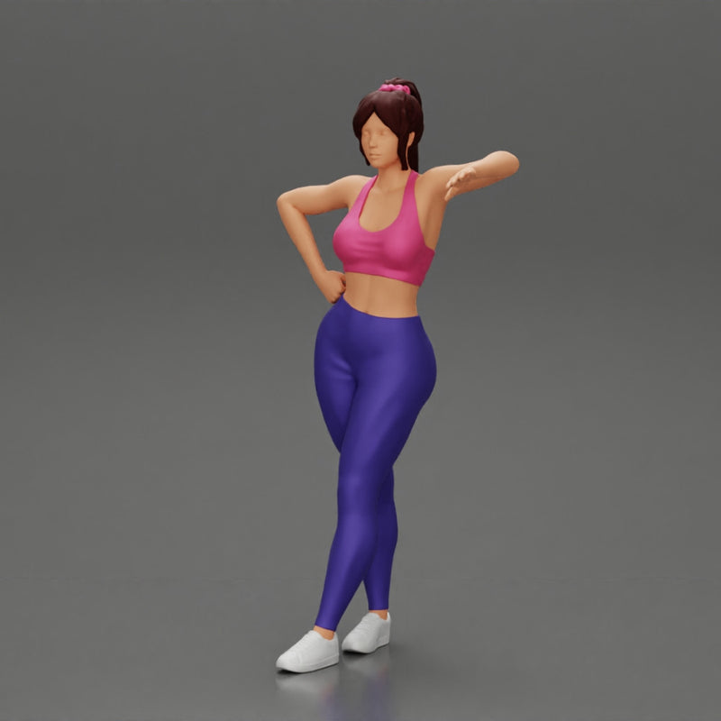 Sexy fitness girl leaning on a wall while standing outdoors - Only-Games