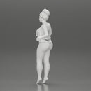 Sexy girl in bikini standing with her friend on the beach - Only-Games