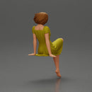 beautiful girl in dress sitting outside with her short hair blowing in the wind - Only-Games