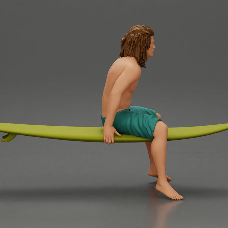 Long-Haired Surfer Sitting on a Surfboard in Calm Ocean Waters, Waiting for the Waves