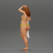 Sexy girl in bikini standing and covering her body by towel - Only-Games