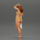 Sexy girl in bikini standing and covering her body by towel - Only-Games