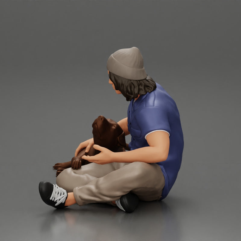 young man in a bonnet sitting crossing his legs and hugging a dog