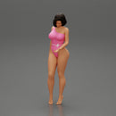 Beautiful girl in onepiece bikini standing on the beach - Only-Games