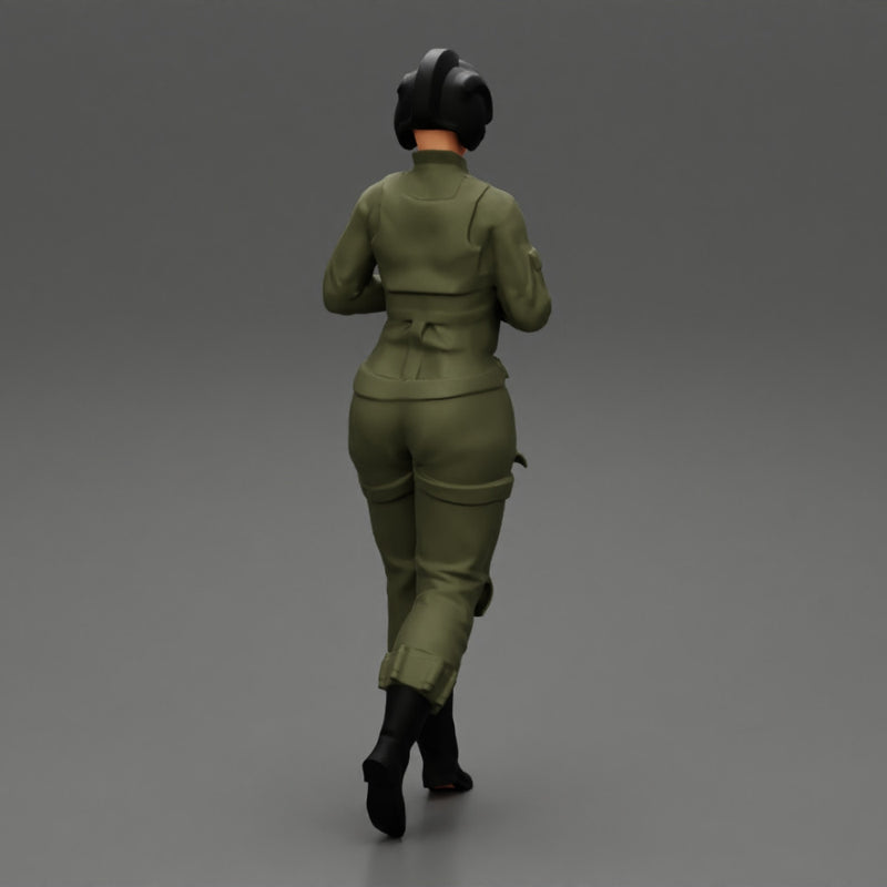 woman fighter pilot walking in helmet